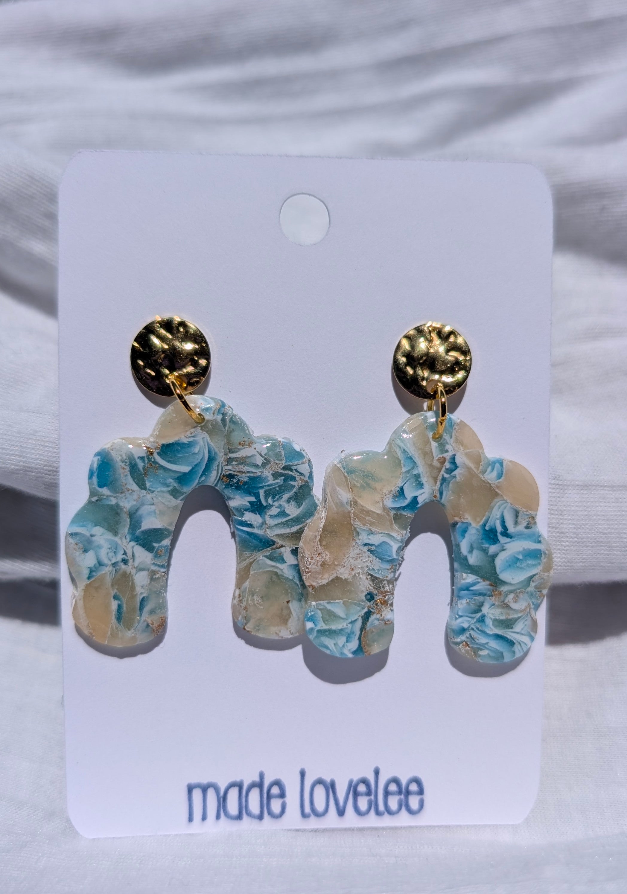 Blue and sand toned marbled arch earrings